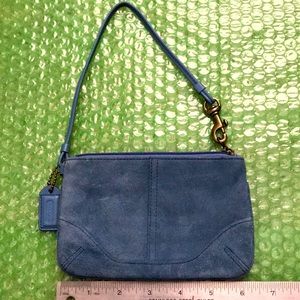 Coach medium dark blue suede wristlet. Preowned.